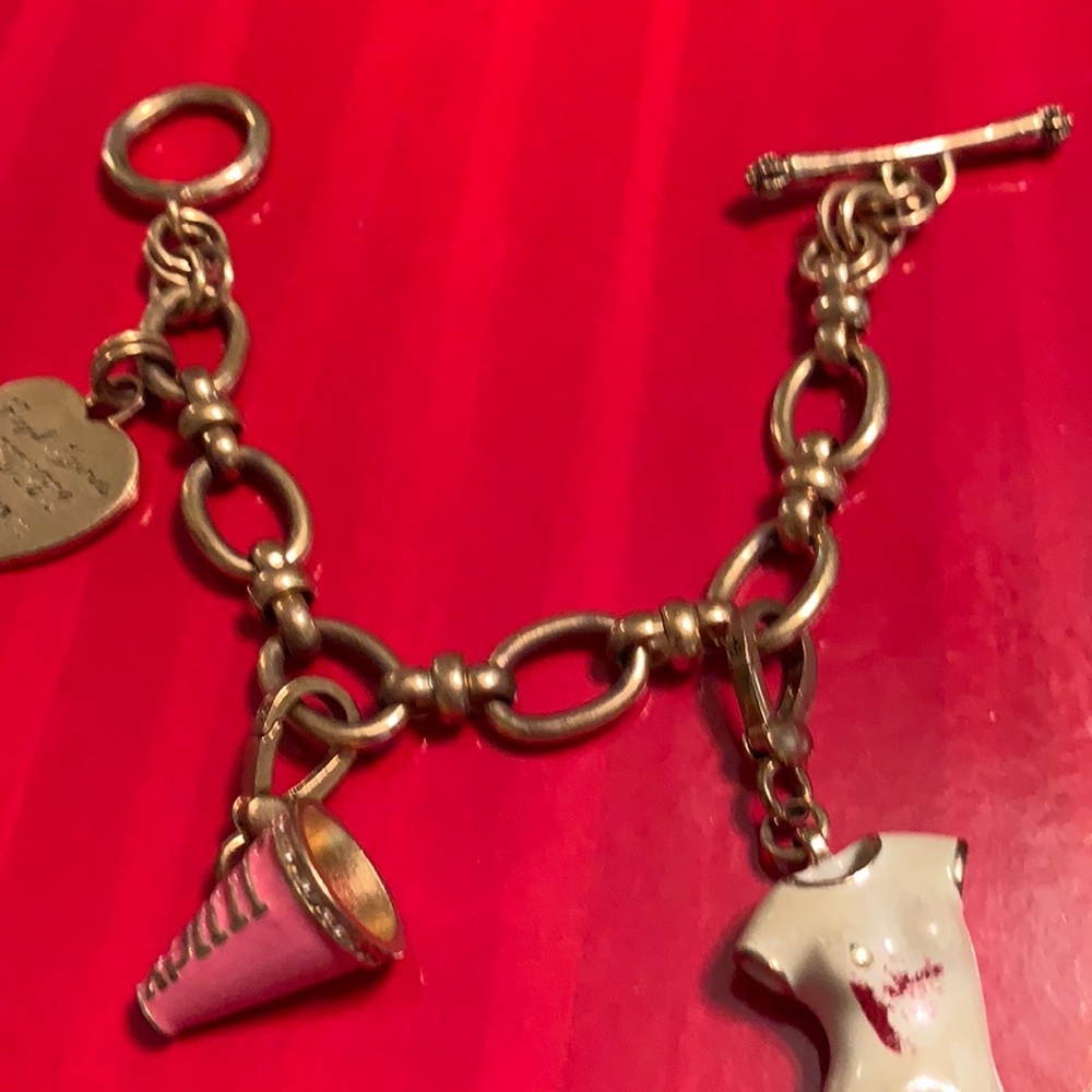 JUICY COUTURE 3 CHARM BRACELET. ONE NOT REMOVABLE
